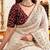 Off white ethnic motifs embroidered satin designer saree