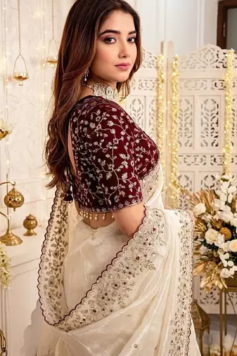 Off white ethnic motifs embroidered satin designer saree