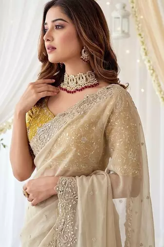 Off white embellished embroidered poly georgette heavy work saree