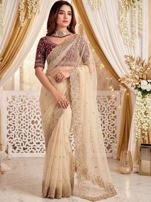 Cream embellished embroidered poly georgette heavy work saree 1