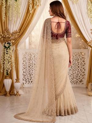 Cream embellished embroidered poly georgette heavy work saree 2