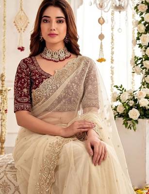 Cream embellished embroidered poly georgette heavy work saree 3