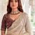 Cream embellished embroidered poly georgette heavy work saree