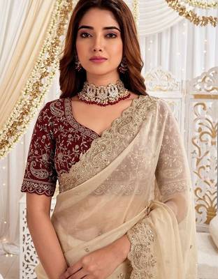 Cream embellished embroidered poly georgette heavy work saree 5