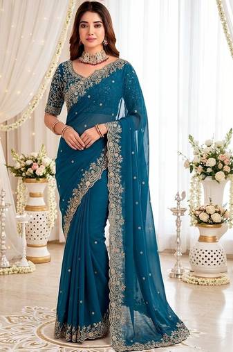 Teal embellished embroidered poly georgette heavy work saree