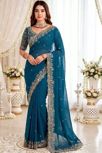 Teal embellished embroidered poly georgette heavy work saree