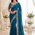 Teal embellished embroidered poly georgette heavy work saree