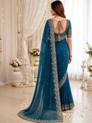 Teal embellished embroidered poly georgette heavy work saree 2