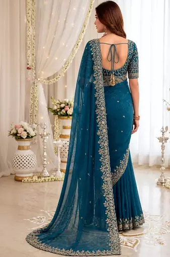Teal embellished embroidered poly georgette heavy work saree