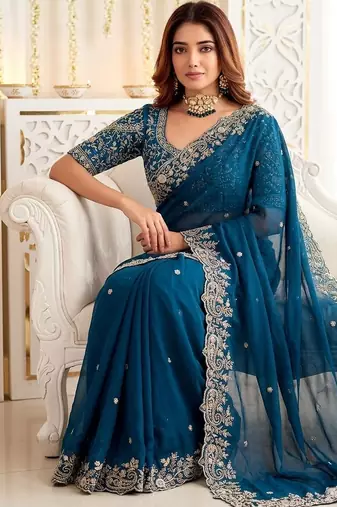 Teal embellished embroidered poly georgette heavy work saree