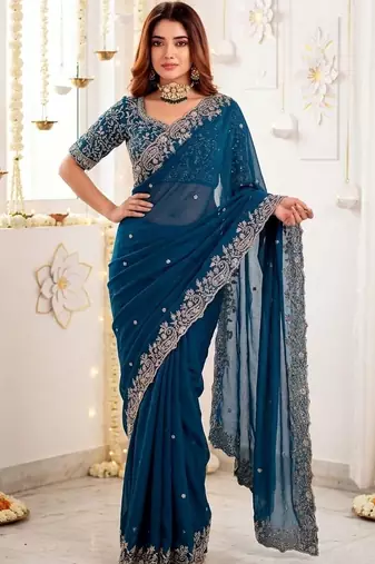 Teal embellished embroidered poly georgette heavy work saree