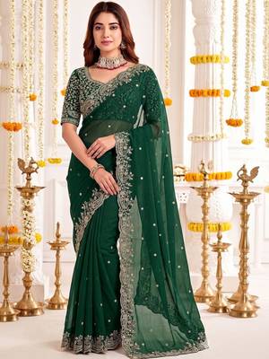 Green embellished embroidered poly georgette heavy work saree 4