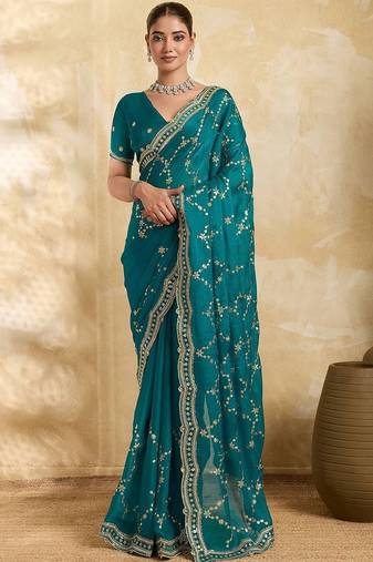 Teal embellished embroidered organza heavy work saree