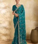 Teal embellished embroidered organza heavy work saree