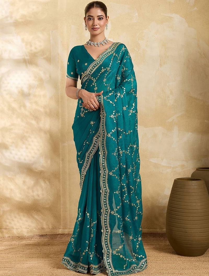 Teal embellished embroidered organza heavy work saree