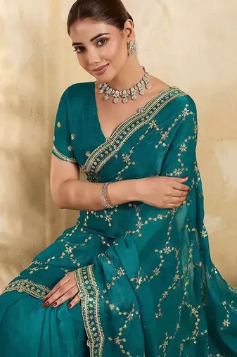 Teal embellished embroidered organza heavy work saree