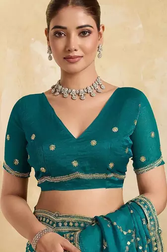 Teal embellished embroidered organza heavy work saree