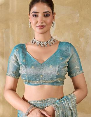 Turquoise embellished zari organza heavy work saree 5