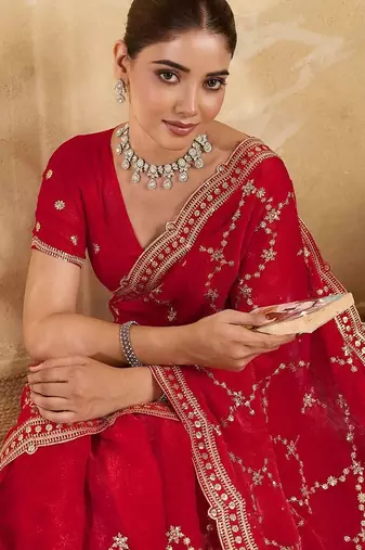 Red embellished organza heavy work saree with blouse piece