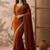 Rust embellished sequinned silk blend saree