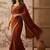 Rust embellished sequinned silk blend saree
