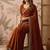 Rust embellished sequinned silk blend saree