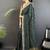 Green bandhani sequinned silk blend designer bandhani saree
