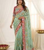 Sea green floral embroidered silk blend designer saree