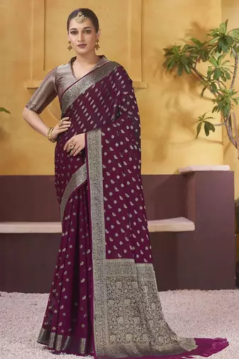 Burgundy ethnic motifs woven design zari  georgette saree with blouse piece