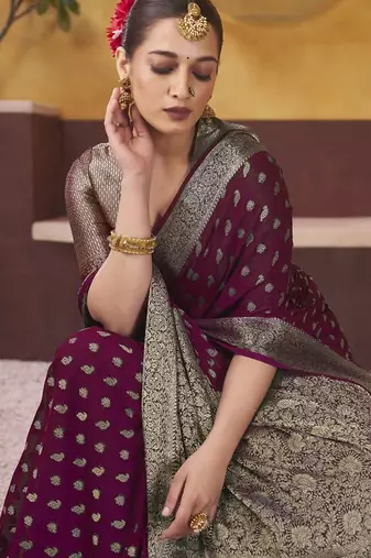 Burgundy ethnic motifs woven design zari  georgette saree with blouse piece