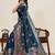 Teal ethnic motifs zari silk blend designer paithani saree