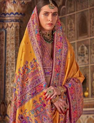 Yellow ethnic motifs embroidered silk blend heavy work saree 4