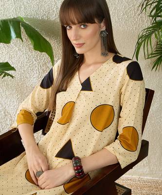 Beige printed cotton kurta trouser set 1