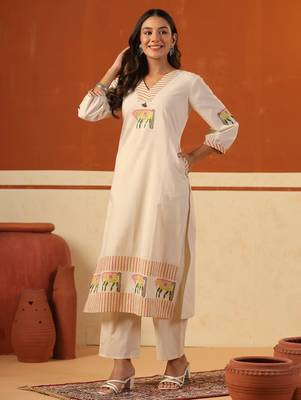 Beige printed cotton kurta trouser set 1