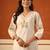 Beige printed cotton kurta trouser set