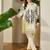 Off white printed cotton kurta trouser set