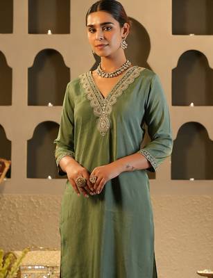 Green embroidered silk kurta trouser set 1