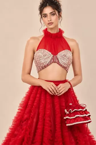 Red Embroidered Mashru Silk Blouse With Ruffle Lehenga And Potli Bag