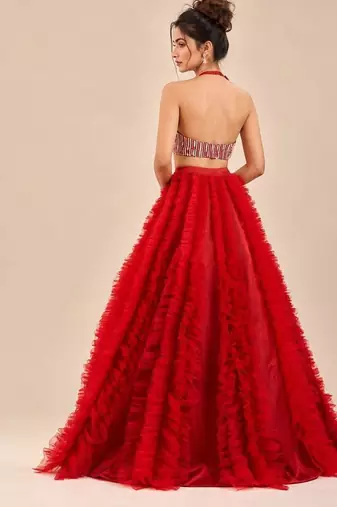 Red Embroidered Mashru Silk Blouse With Ruffle Lehenga And Potli Bag