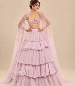 Lilac Ruffle Layered Lehenga With Embroidered Cape Attached Blouse