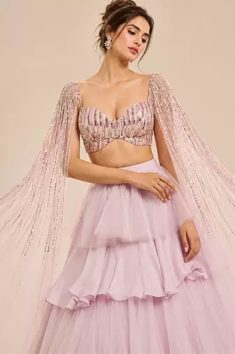 Lilac Ruffle Layered Lehenga With Embroidered Cape Attached Blouse