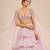 Lilac Ruffle Layered Lehenga With Embroidered Cape Attached Blouse