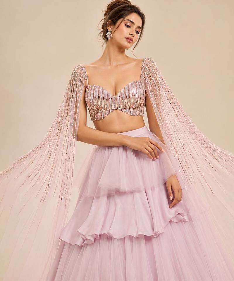 Lilac Ruffle Layered Lehenga With Embroidered Cape Attached Blouse
