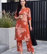 Orange printed viscose rayon kurta trouser set