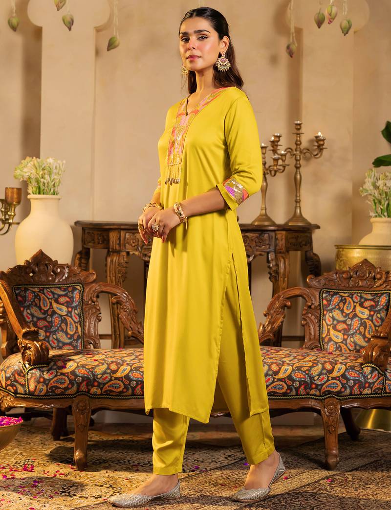 Yellow embroidered silk kurta trouser set