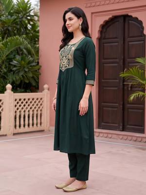 Green embroidered cotton kurta trouser set 4