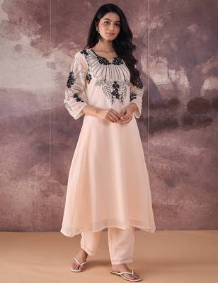 Beige embroidered georgette kurta trouser set 1