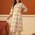 Beige printed cotton kurta trouser set