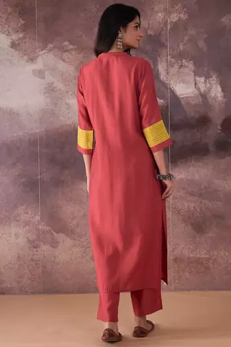Orange embroidered silk kurta trouser set