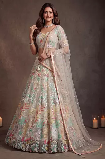 Bewitching White Thread and Multiple Sequins Embroidered Soft Net reception wear lehenga